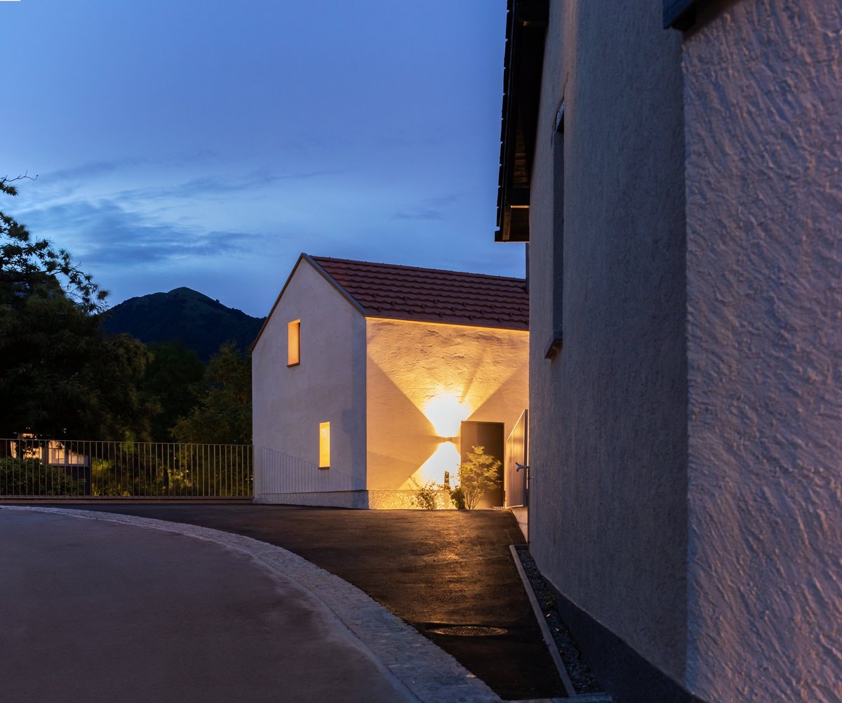 Single-family house exterior with warm Govee lighting in the evening