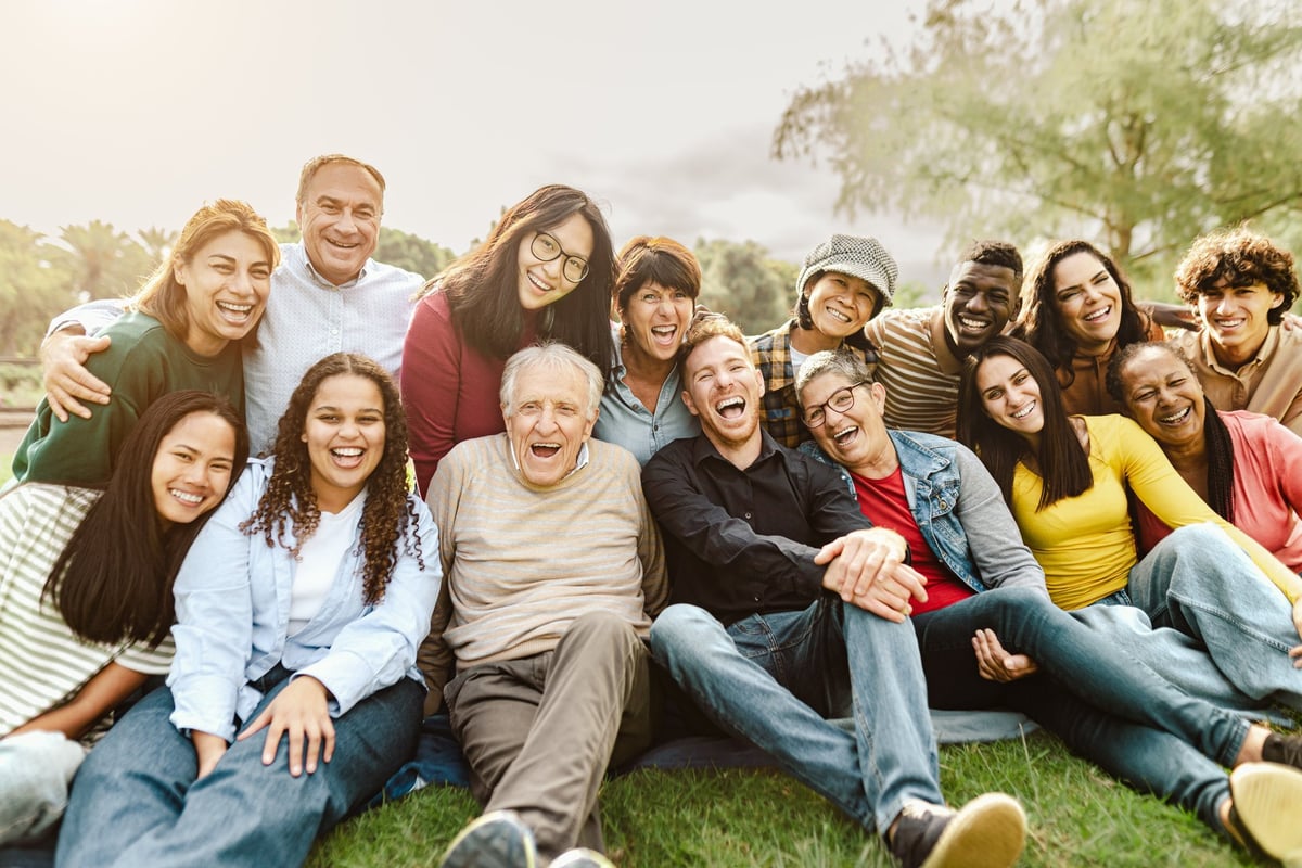 Happy multigenerational people having fun on grass customer review