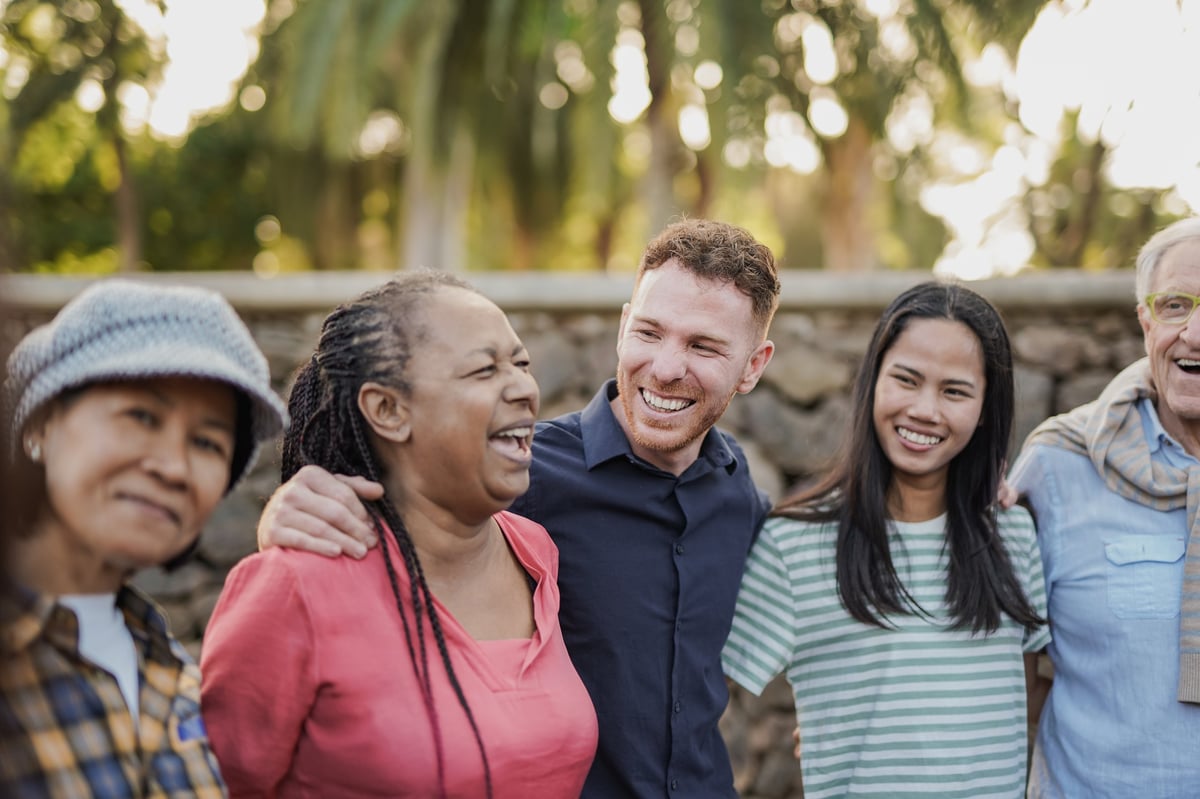 Happy multigenerational people hugging outdoors customer review