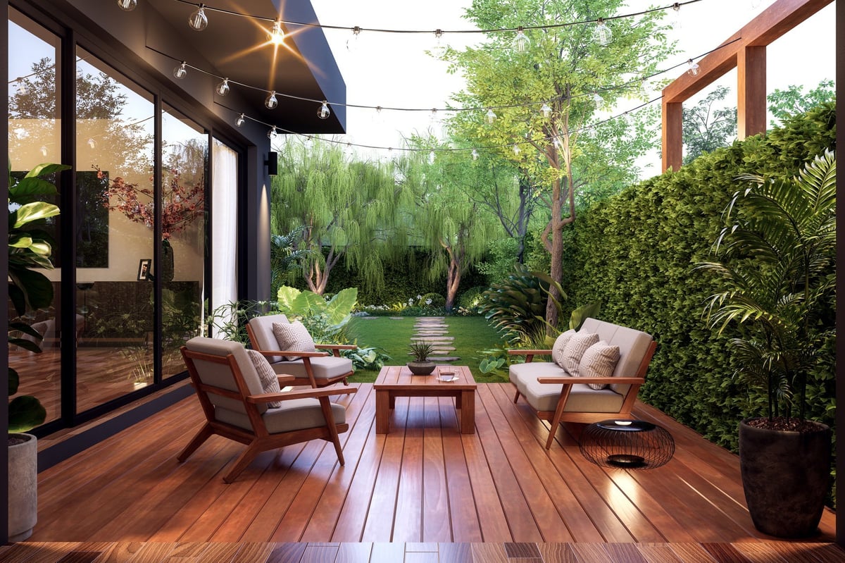 Modern terrace with garden view and string lights