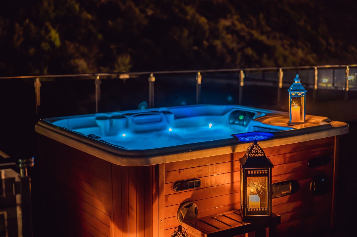 Hot tub with candles ready for a relaxing bath
