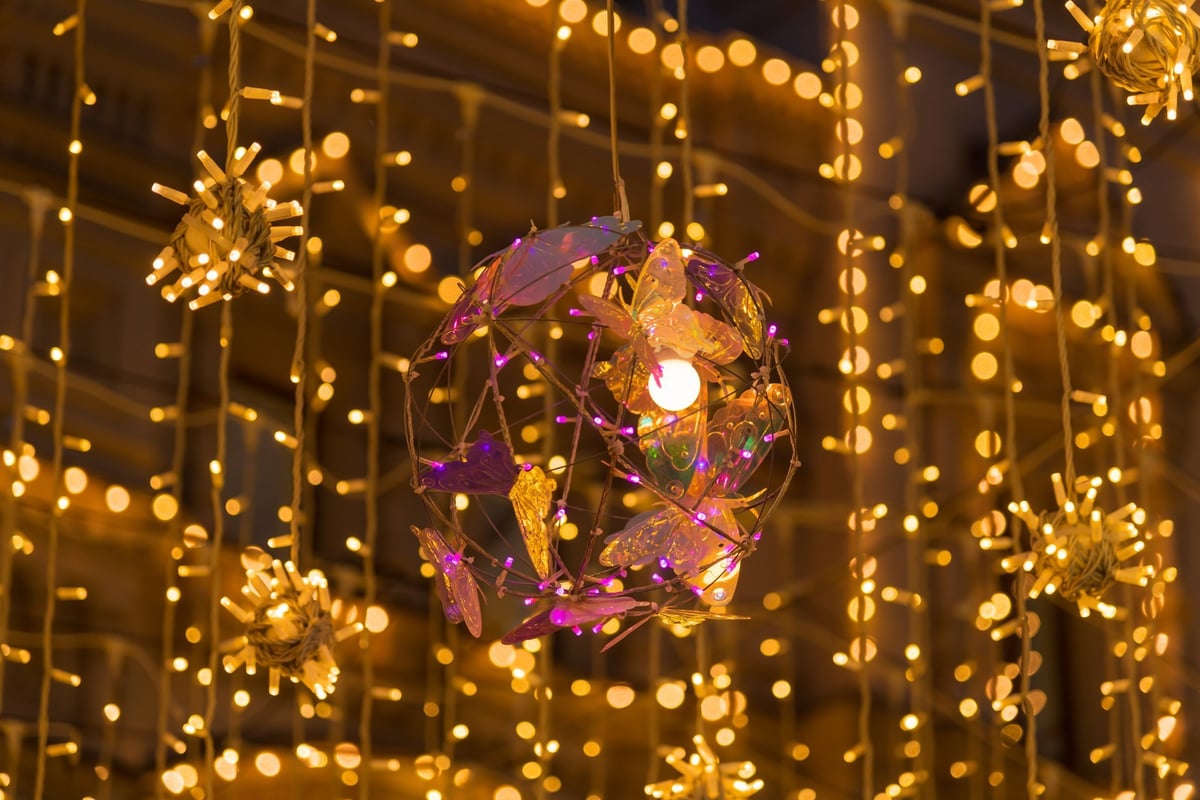String lights hanging in rows creating a celebratory atmosphere