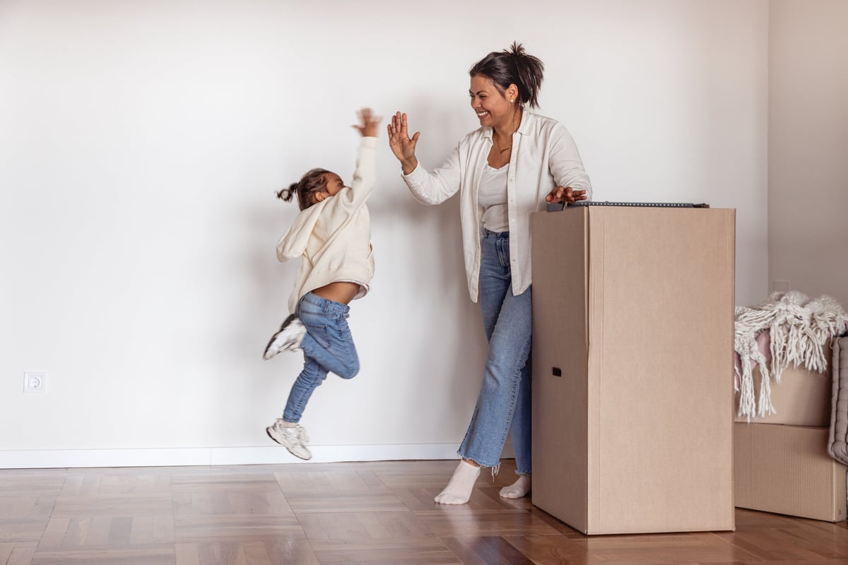 Mother and child celebrating moving into a new house customer review