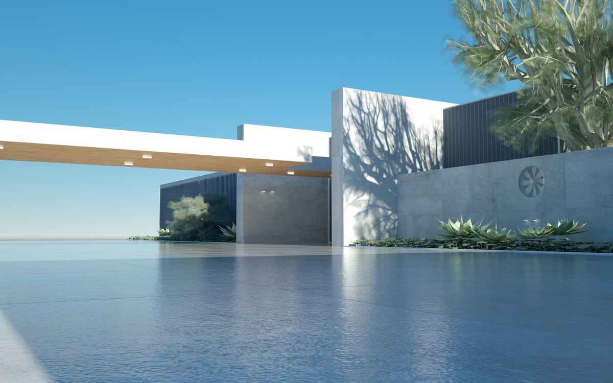 Serene modern minimalist estate beside a reflective infinity pool